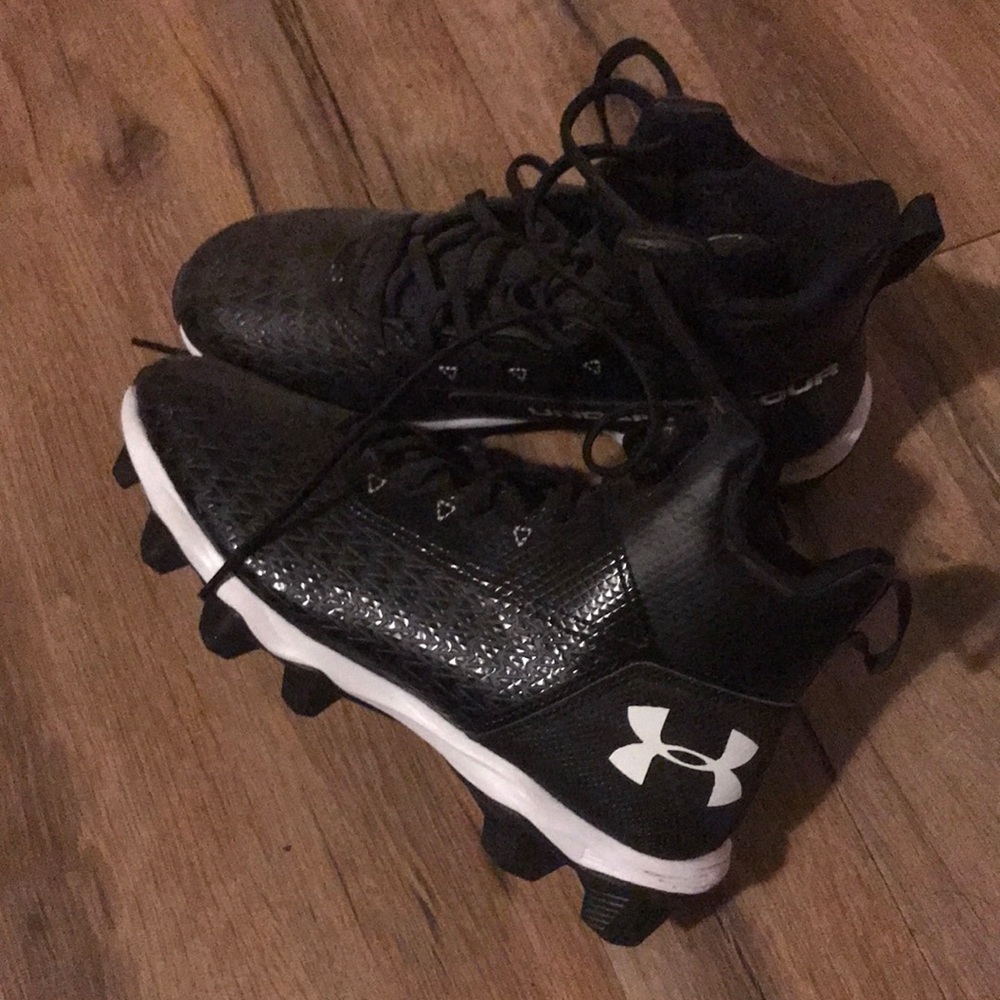 New boys under armour football cleats